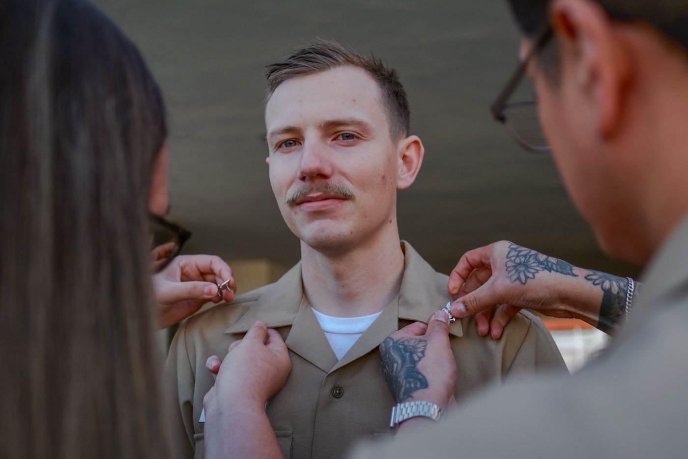 Zachary Gould in Navy uniform at his pinning ceremony